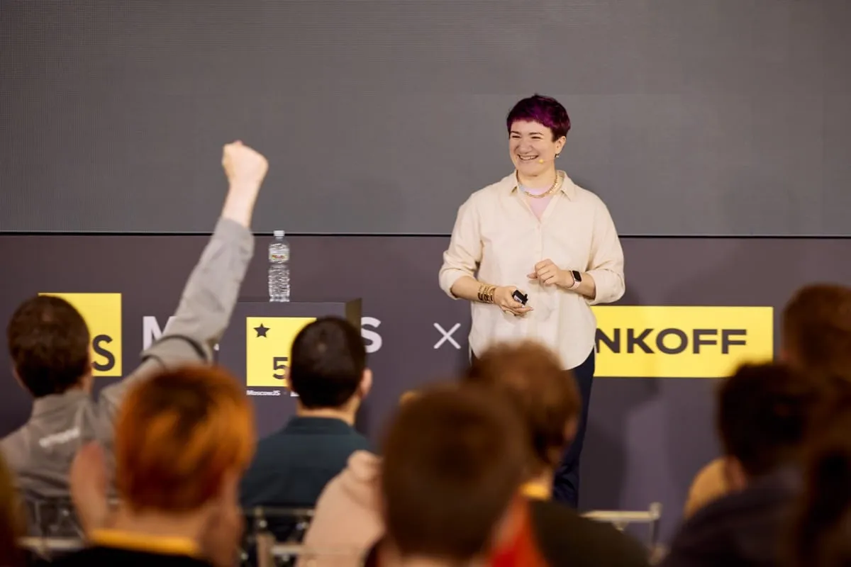 Photo of Zarema Khalilova on stage at MoscowJS 50 event in 2021 during the talk 'So what next?'