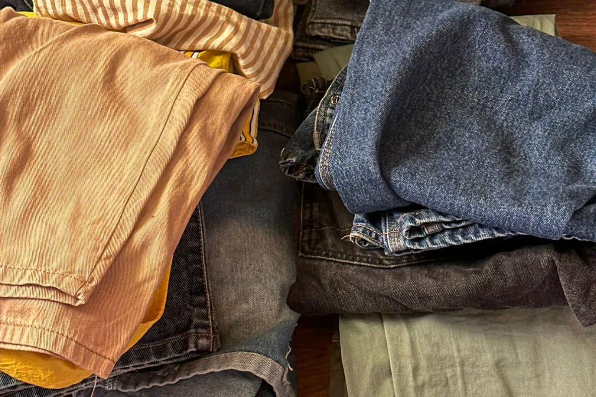 Stack of folded jeans on the table
